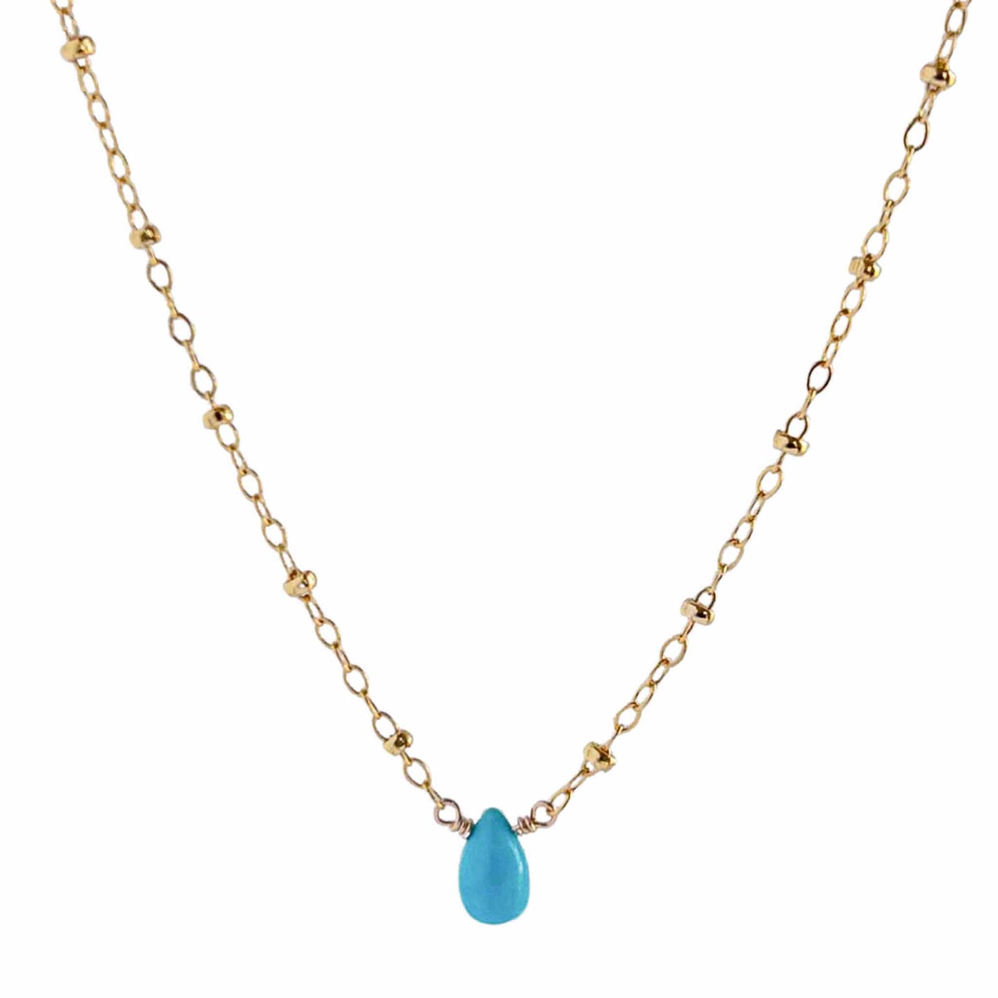 close up of turquoise teardrop necklace