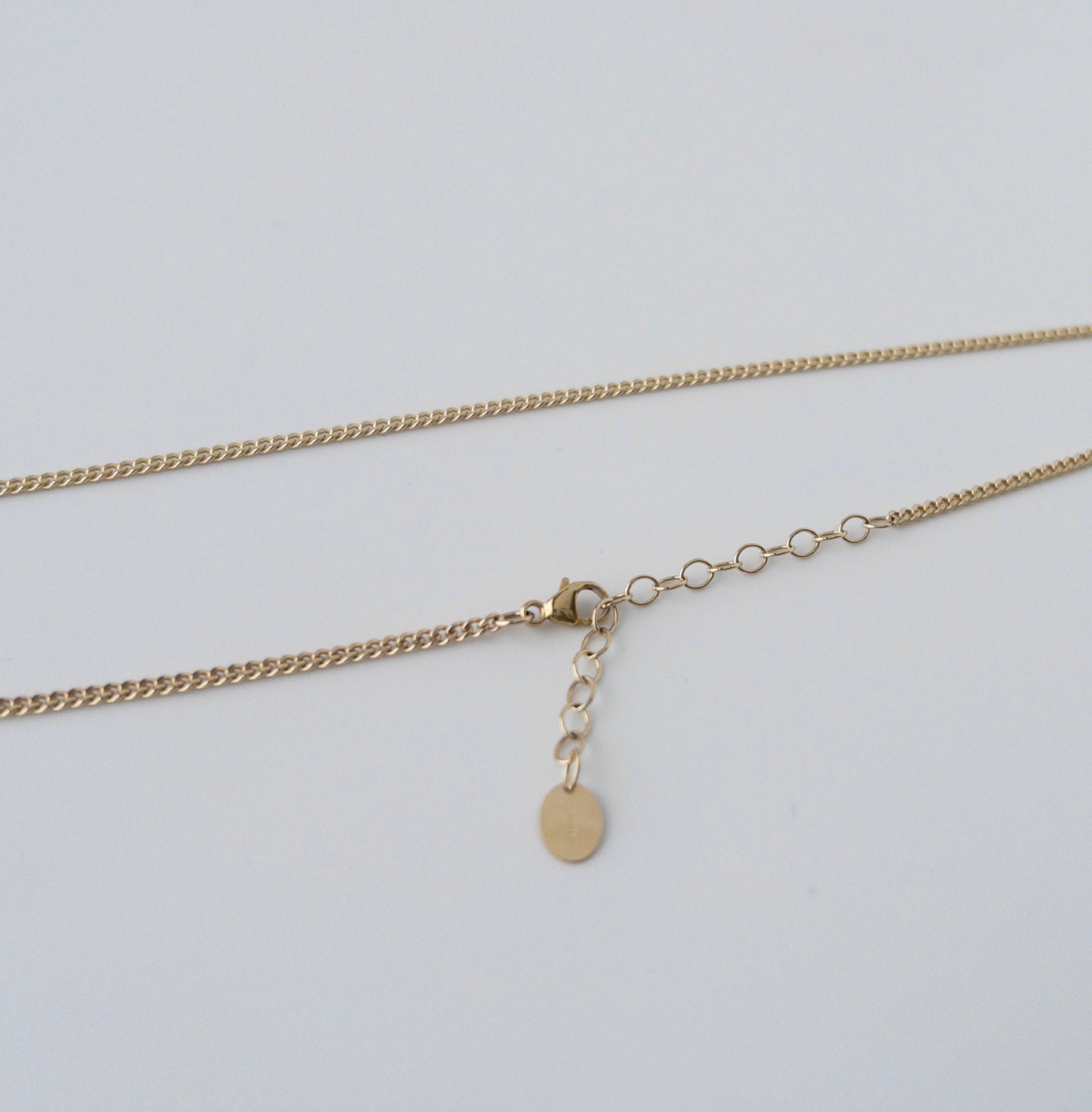 lobster clasp and extender from large pearl necklace