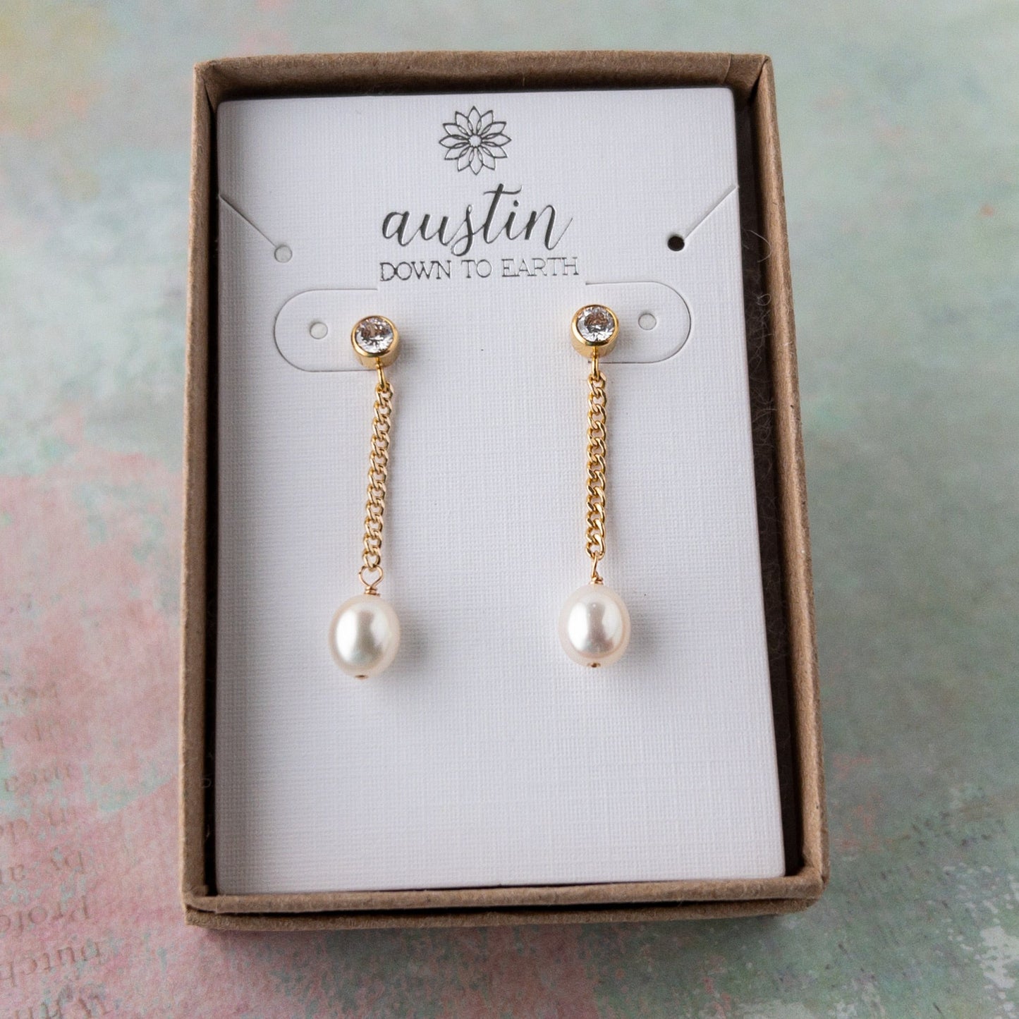 Pearl Dangle Earrings featuring a cubic zirconia stud, curb chain and freshwater pearls shown in gift box
