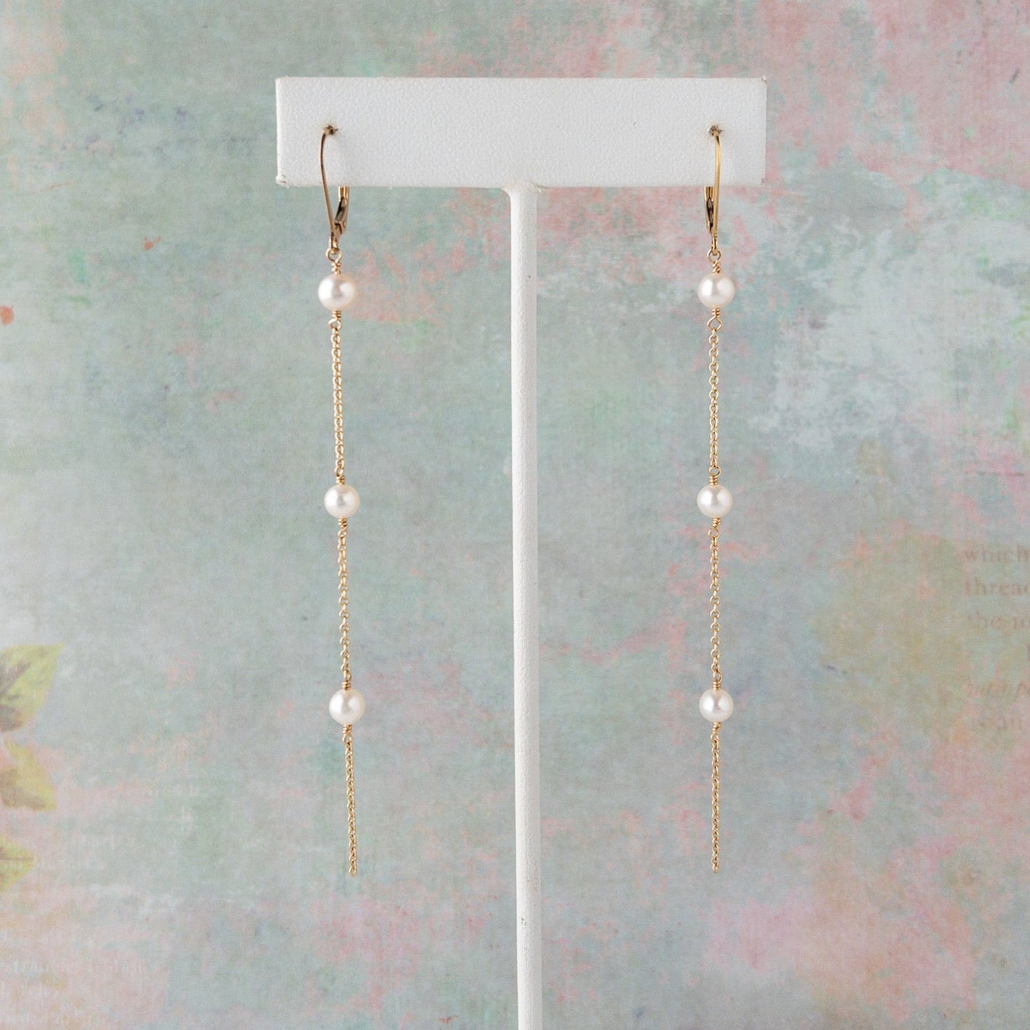 Lucia Long Pearl Earrings on Stand