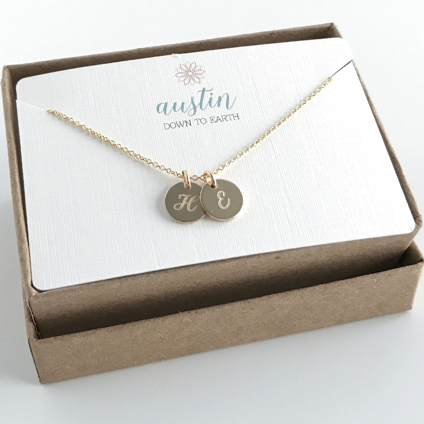 gift box with 14k gold filled necklace and small engraved charms