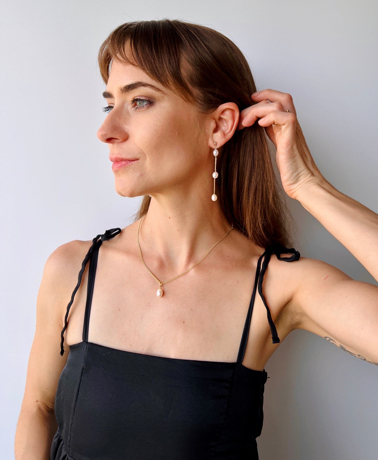 Sterling Silver dangle earrings on model