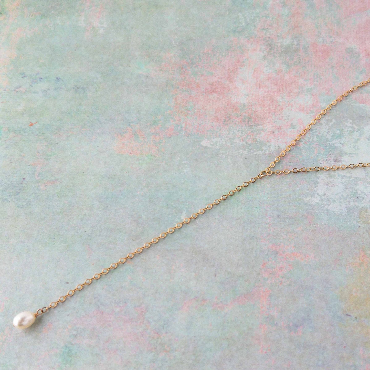 close up of Pearl Y necklace in 14k gold filled