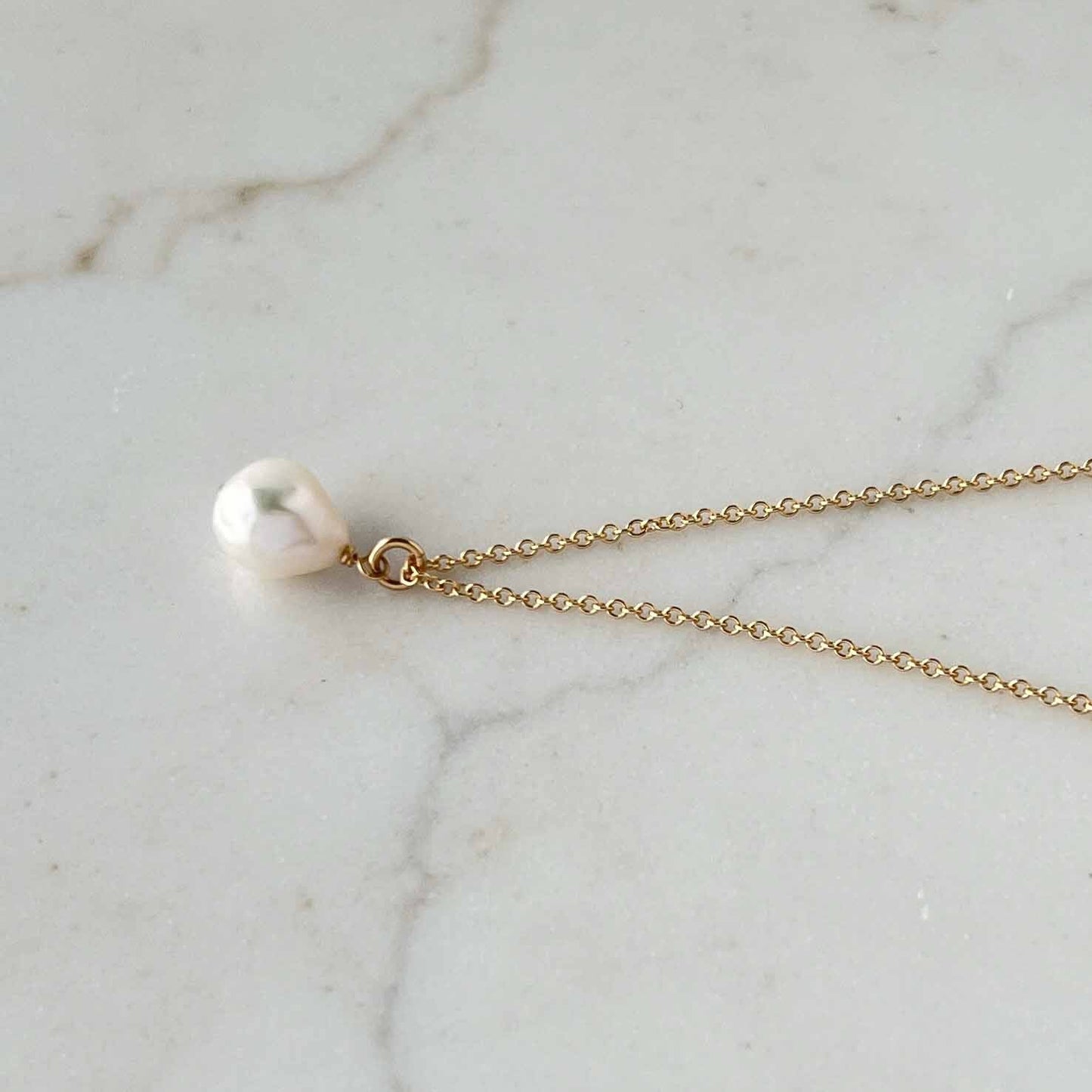 close up of pearl pendant