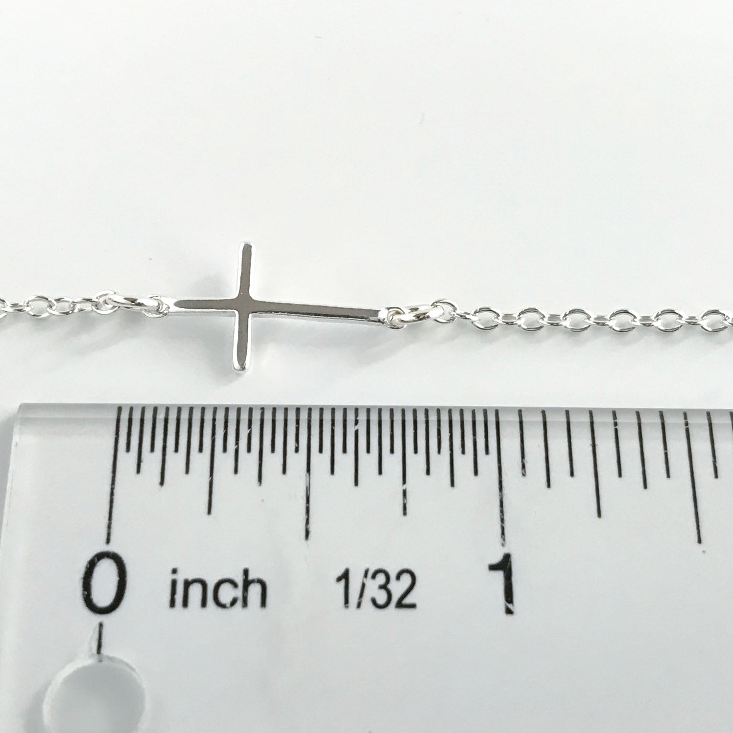 silver cross measures approx .75 inches