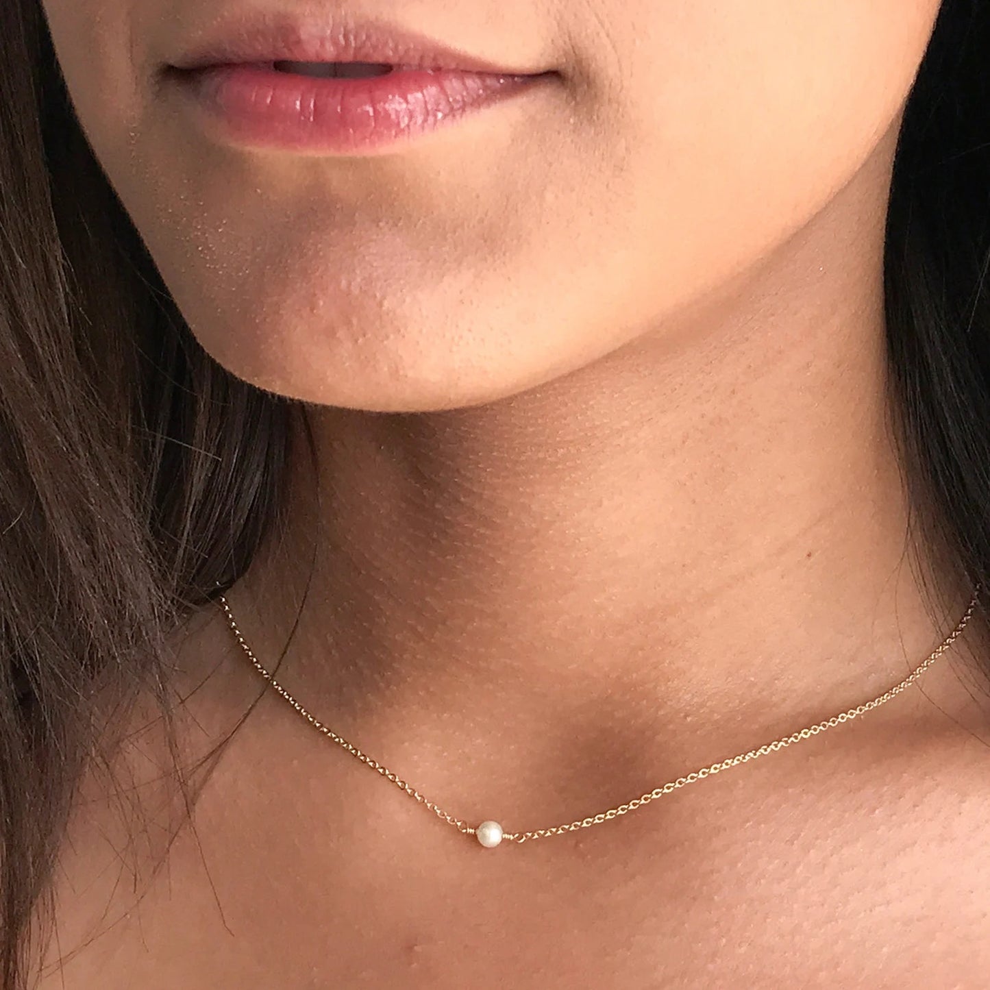 model wearing Lucia Akoya Pearl Necklace on 14k gold filled chain