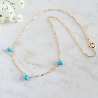dainty turquoise necklace with 3 teardrops of sleeping beauty turquoise in gold
