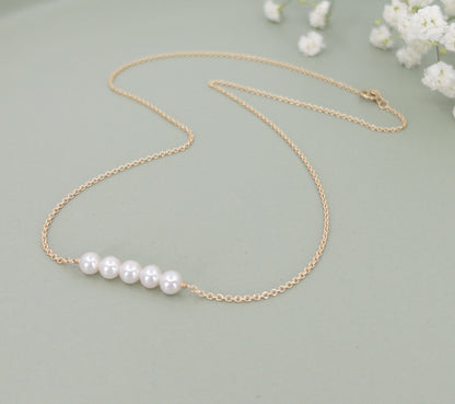 5 pearls on gold chain