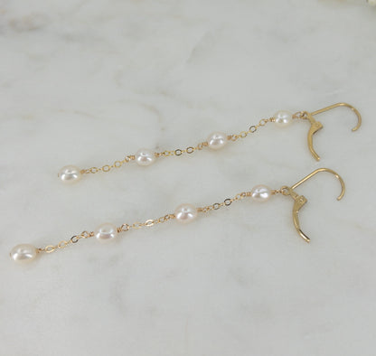 photo of leverback earrings open with long pearl dangles