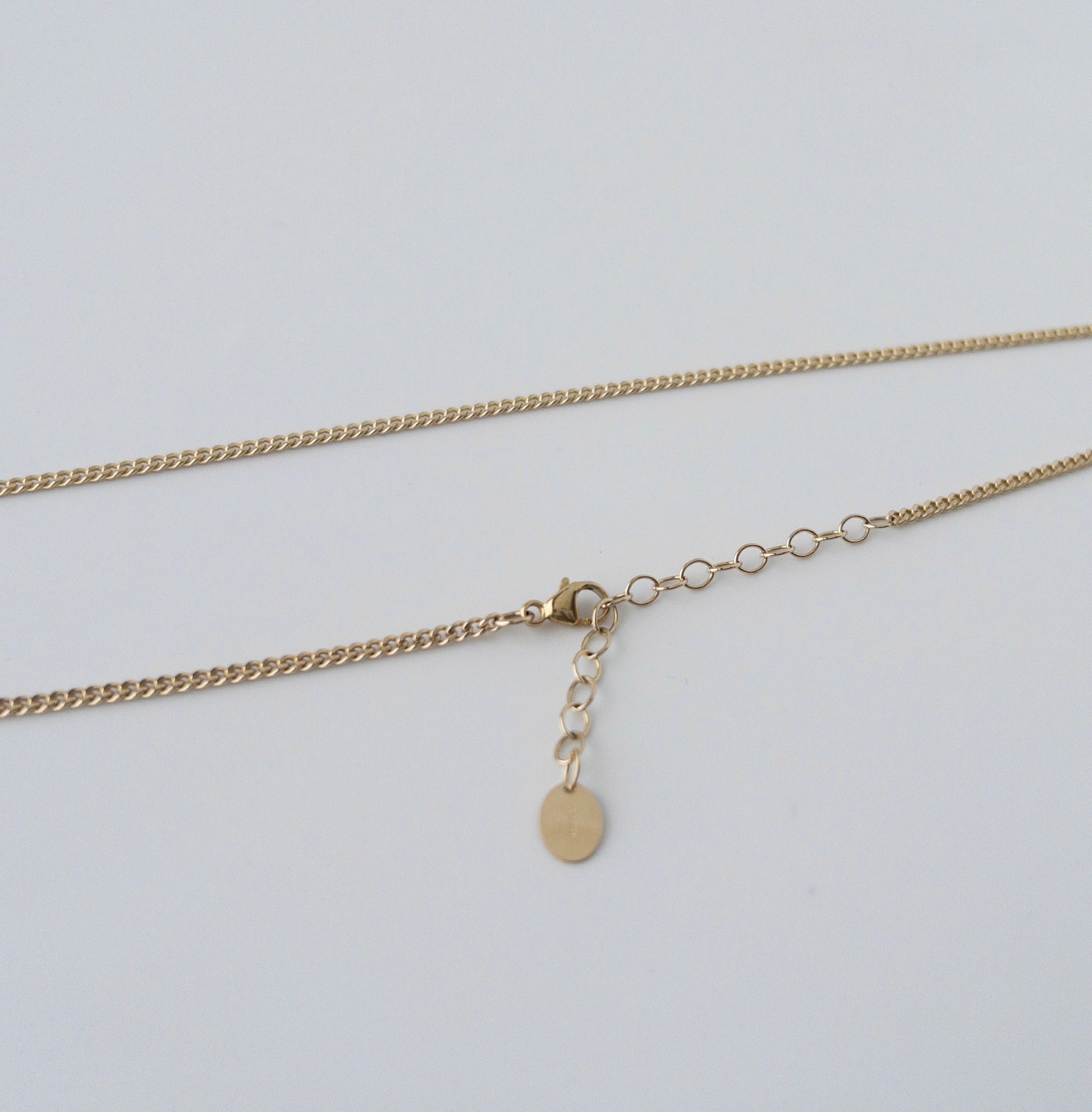 lobster clasp and extender from large pearl necklace