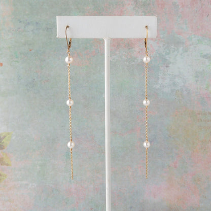 Lucia Long Pearl Earrings on Stand