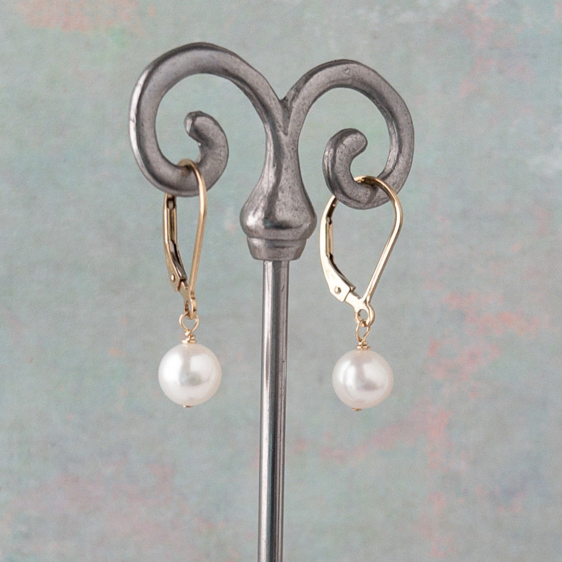 Lucia Leverback freshwater pearl earrings on earring stand