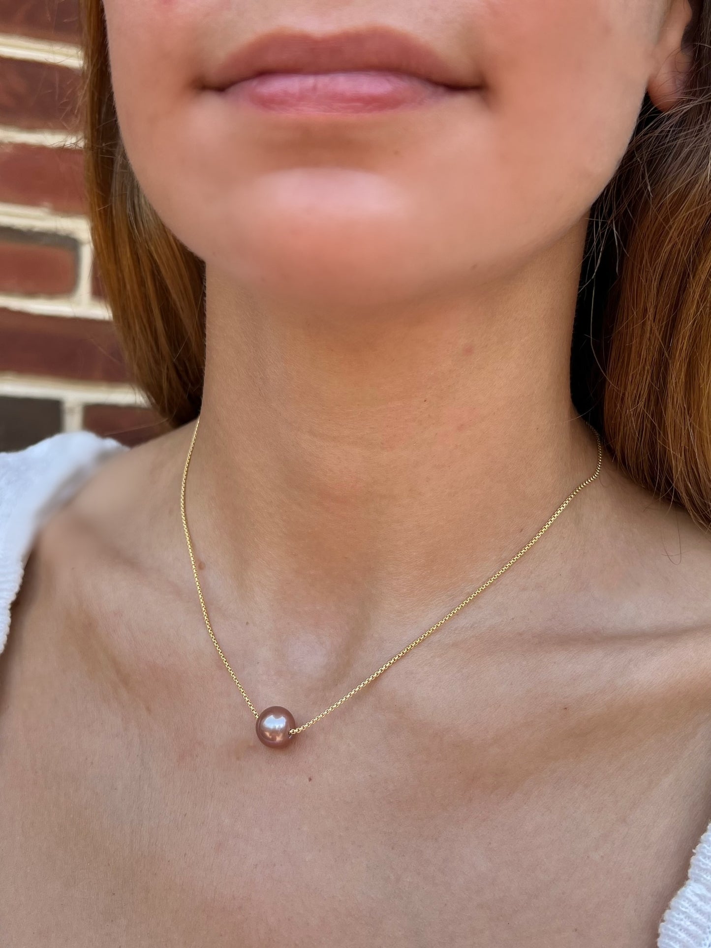Mauve Pink Large Pearl Necklace on model