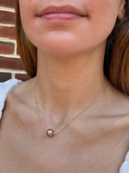 Mauve Pink Large Pearl Necklace on model