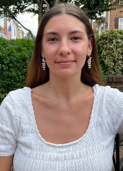 model wearing long pearl earrings perfect for wedding earrings