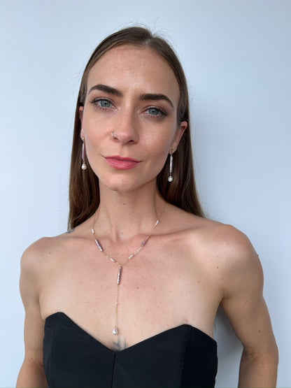 model with lavender biwa pearl lariat necklace and matching earrings