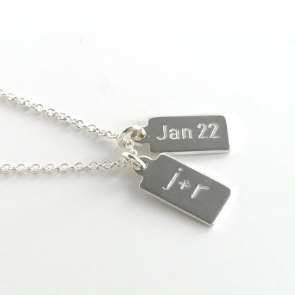 close up of engraved small dog tags