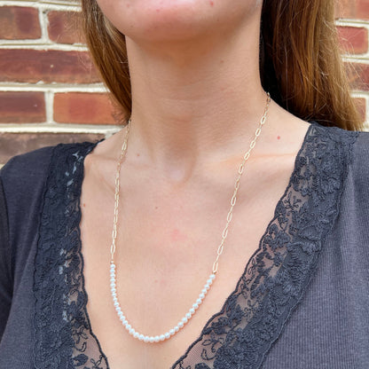 model wearing add a pearl look necklace with paperclip chain and small white freshwater pearls