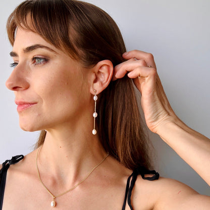 Sterling Silver dangle earrings on model