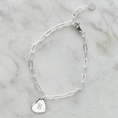 Sterling Silver bracelet with a heart-shaped charm engraved with a single letter