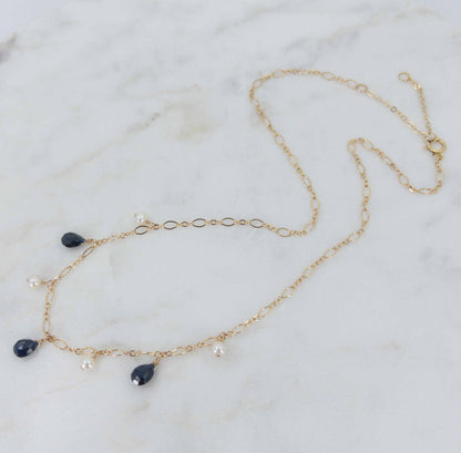 sapphire necklace shown in gold