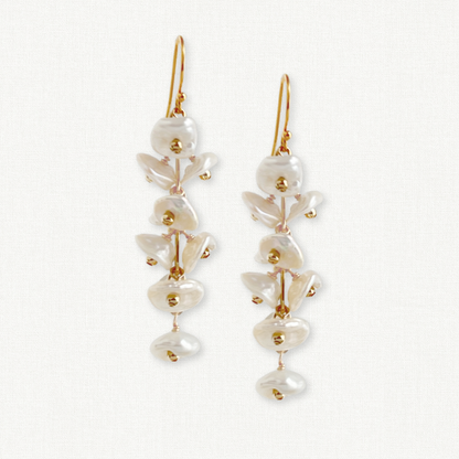 keshi pearls dangle on a chain for these bridal earrings