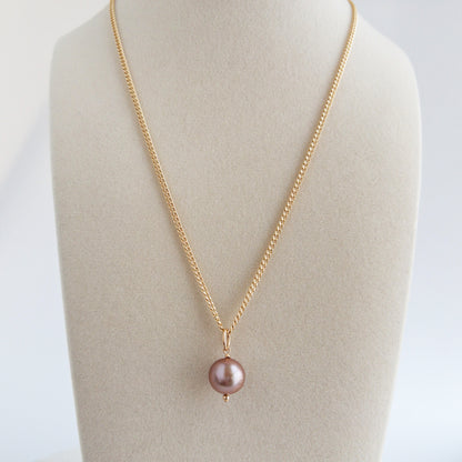 Edison pearl pendant on necklace stand