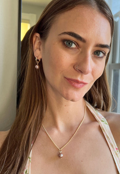 model wearing edison pearl pendant necklace with matching earrings in 14k gold filled.  also available in sterling silver
