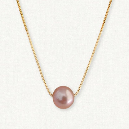 close up of Edison pearl on round box chain