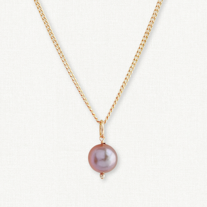 close up of mauve or dark pink freshwater edison pearl pendant on 14k gold filled chain