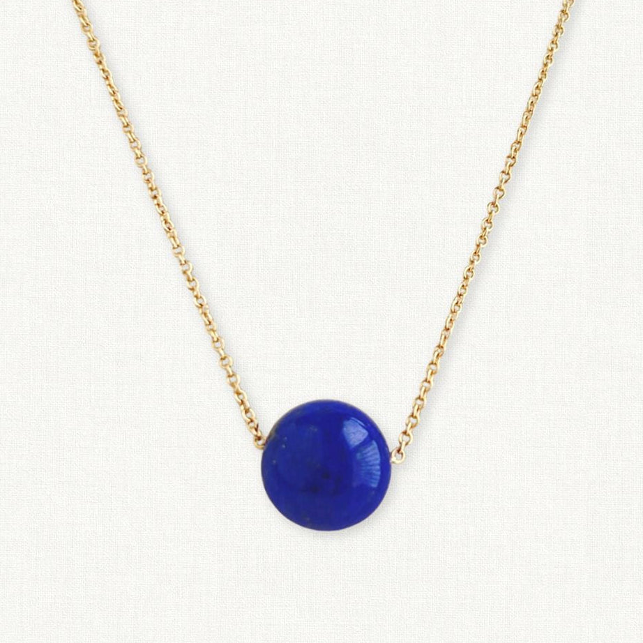 Large Lapis ball necklace floating on gold chain 