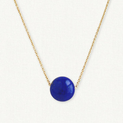 Large Lapis ball necklace floating on gold chain 