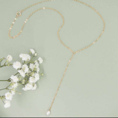 Pearl lariat or y necklace in gold