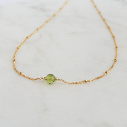 Peridot Necklace close up on 14k gold filled satellite chain