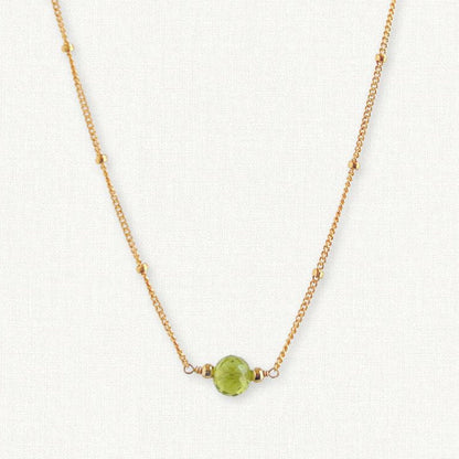 Tiny Peridot birthstone on 14k gold filled satellite chain.