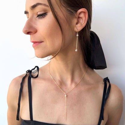 Model wearing Necklace and Earrings Set of Rosa Pearl Jewelry