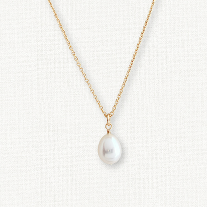 close up of oval pearl necklace on 14k gold filled chain.  Classic pearl necklace for everyday