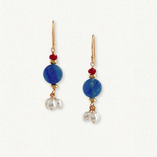 Small round kyanite stone with 3 dangling pearls below and a small ruby on top on fishhook ear wire