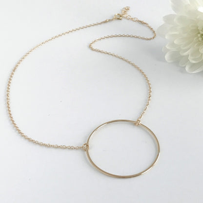 product full view of 14k gold filled circle necklace