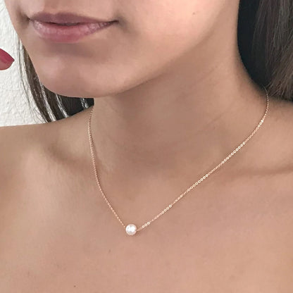 model wearing the Lucia saltwater pearl necklace on 14k gold filled chain