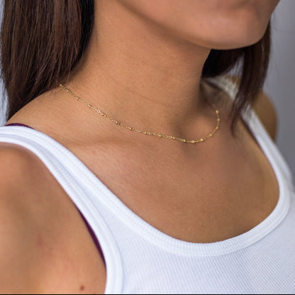 model wearing 14k gold filled bead chain necklace