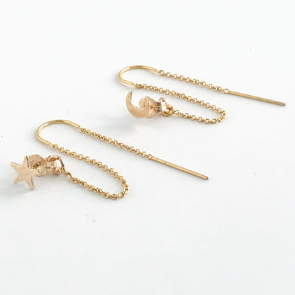 pari of star and moon double piercing earrings in 14k gold filled