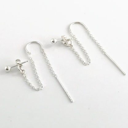 product close up of sterling silver double hole earrings designed for two ear lobe piercings
