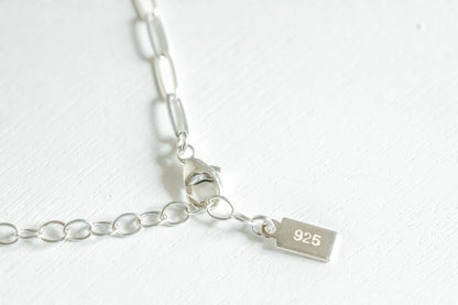 close up of lobster clasp and extender on bracelet
